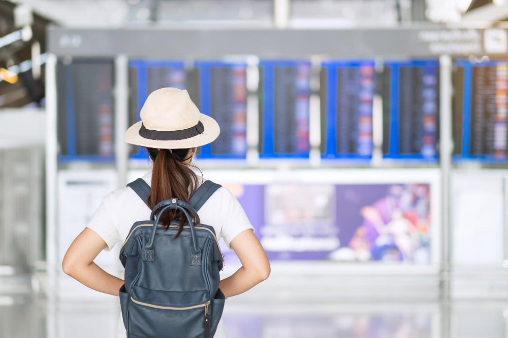 woman standing at bangkok airport
